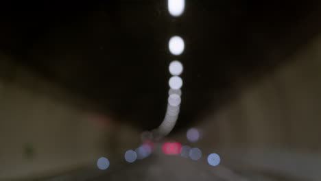 blurred tunnel lights at night