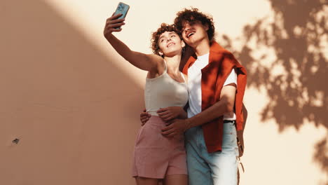 couple taking a selfie outdoors