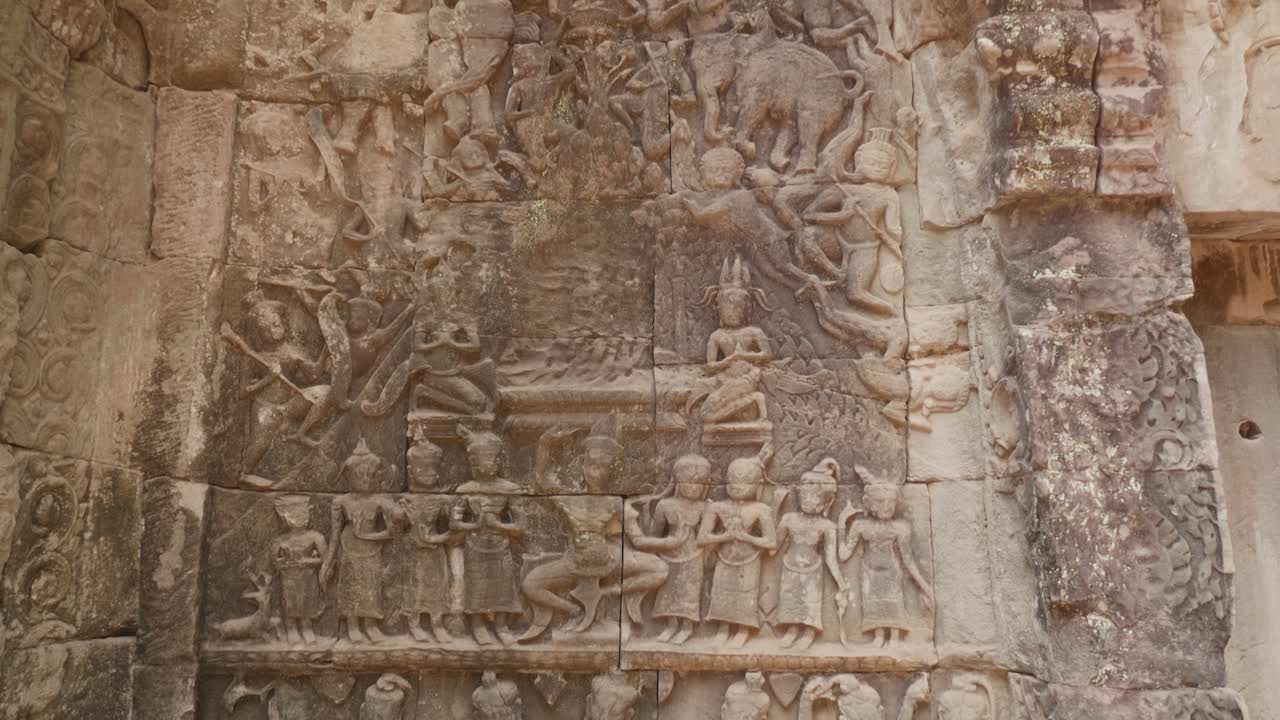 Upwards Tilt Showing Wall Art From The Temples Of Angkor Wat. 4K.