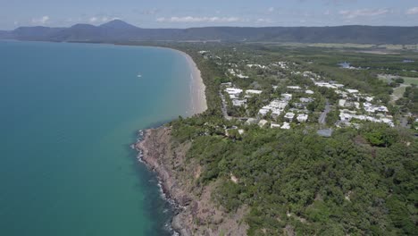 aerial of flagstaff hill walking trail and four mile beach in port douglas, queensland