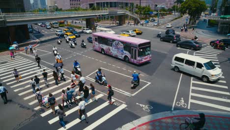 taipei, taiwan - a busy street in xinyi financial district of taipei city in the late evening