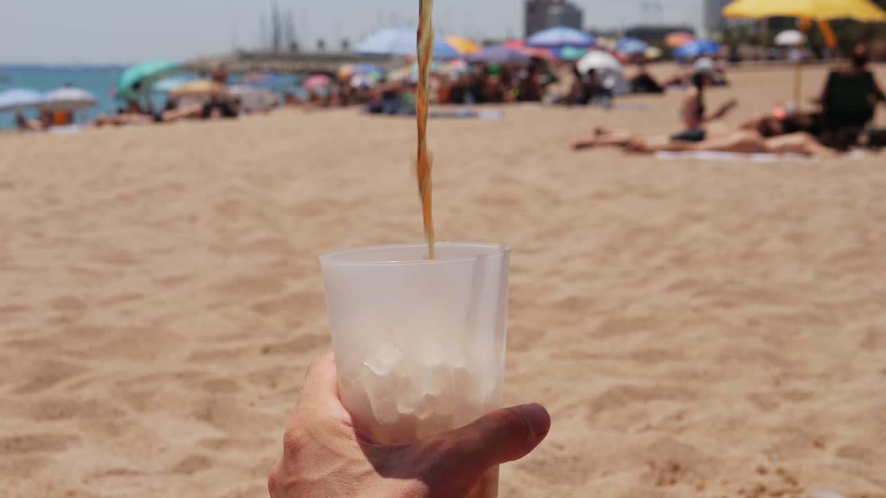 Enjoying a Drink on the Beach