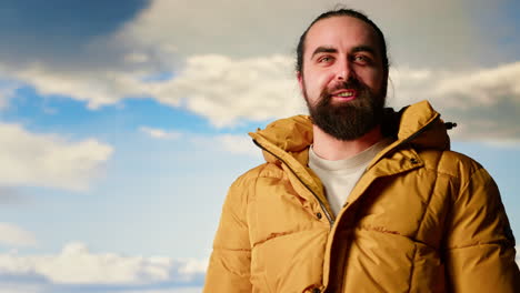 climber celebrates at a breathtaking mountain summit relishing the scenic view