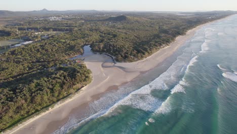 aerial view of stumers creek through the coolum beach in sunshine coast, qld australia