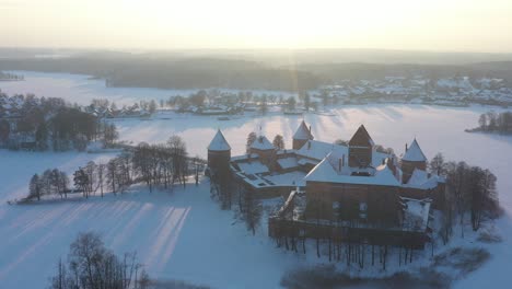 Aerial-view-of-Trakai-Island-Castle-in-winter-time,-Lithuania