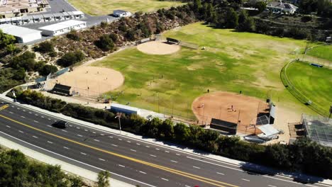 aerial panning shot of little league baseball fields angle 1