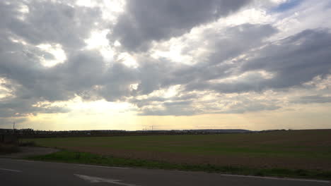 timelapse in the fields with beautiful sun and clouds
