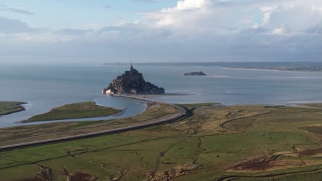 drone flies to mont saint michel in brittany in france, beautiful and sunny weather