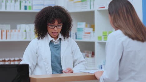 patient signing up to buy medicine from pharmacist