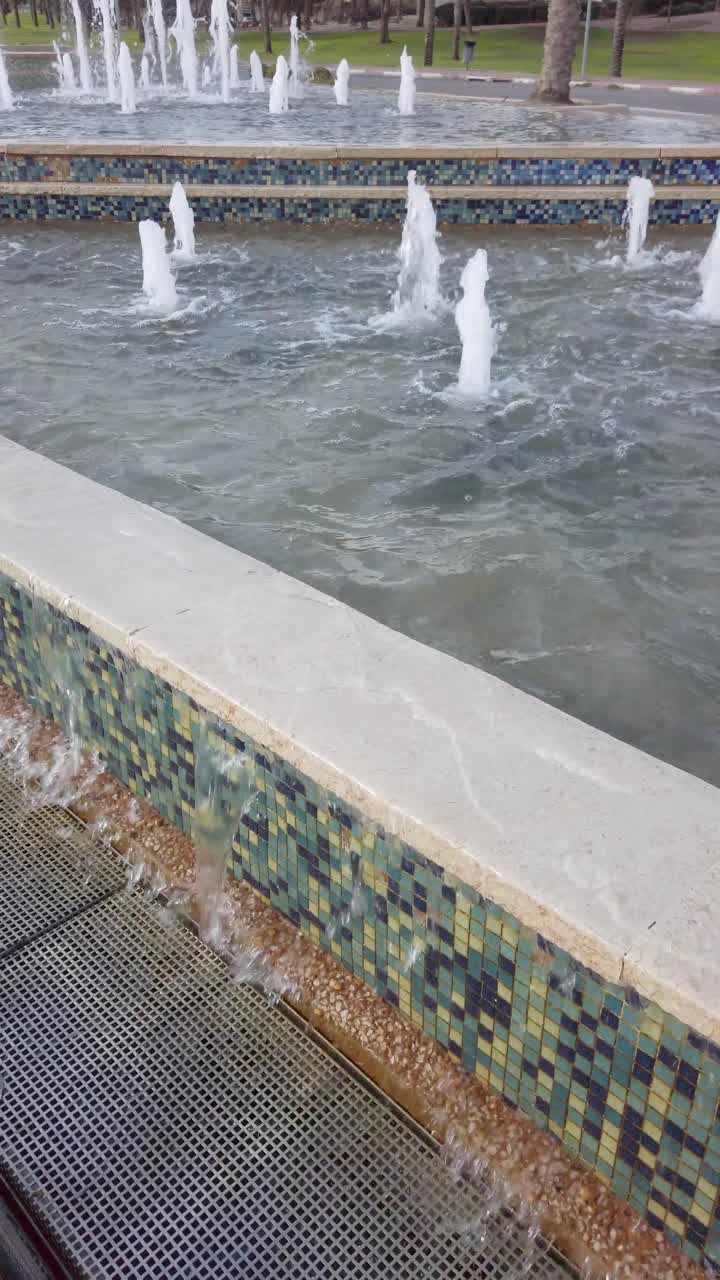 A fountain with water shooting out of it