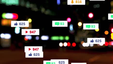 Animation-of-social-media-icons-and-numbers-over-out-of-focus-city-and-traffic-lights