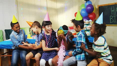 celebrating birthday, children playing with confetti in animated party scene