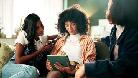 three friends looking at a tablet