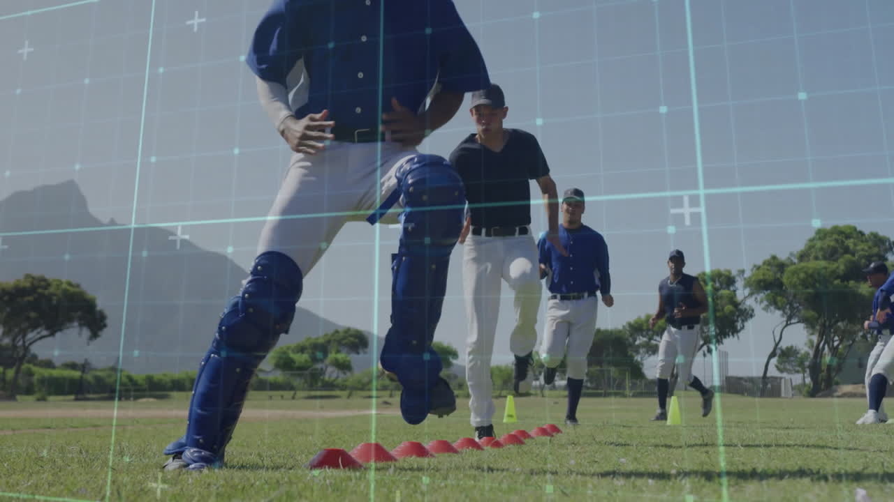Baseball players training on field with digital grid animation overlay