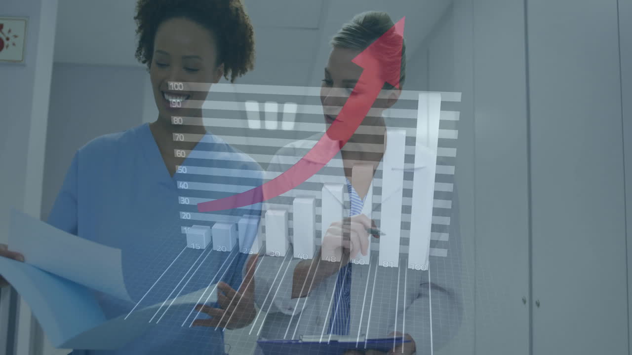 Female nurse and doctor reviewing papers on clipboard in hospital hall overlaying digital bar graph