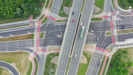 aerial view over a highway interchange during peak hour traffic