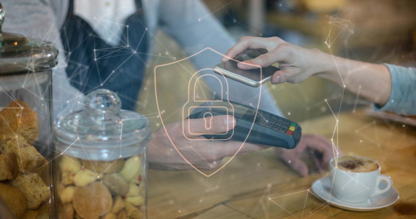 Animation of data processing and padlock over hands paying with smartphone