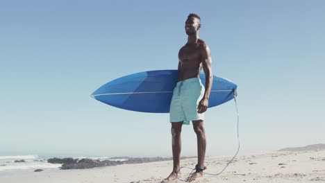 african american man ready to go surf