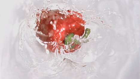 pepper falling into water in super slow motion