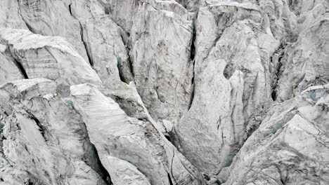 close up aerial view of crevasses of the moiry glacier near grimentz in valais, switzerland