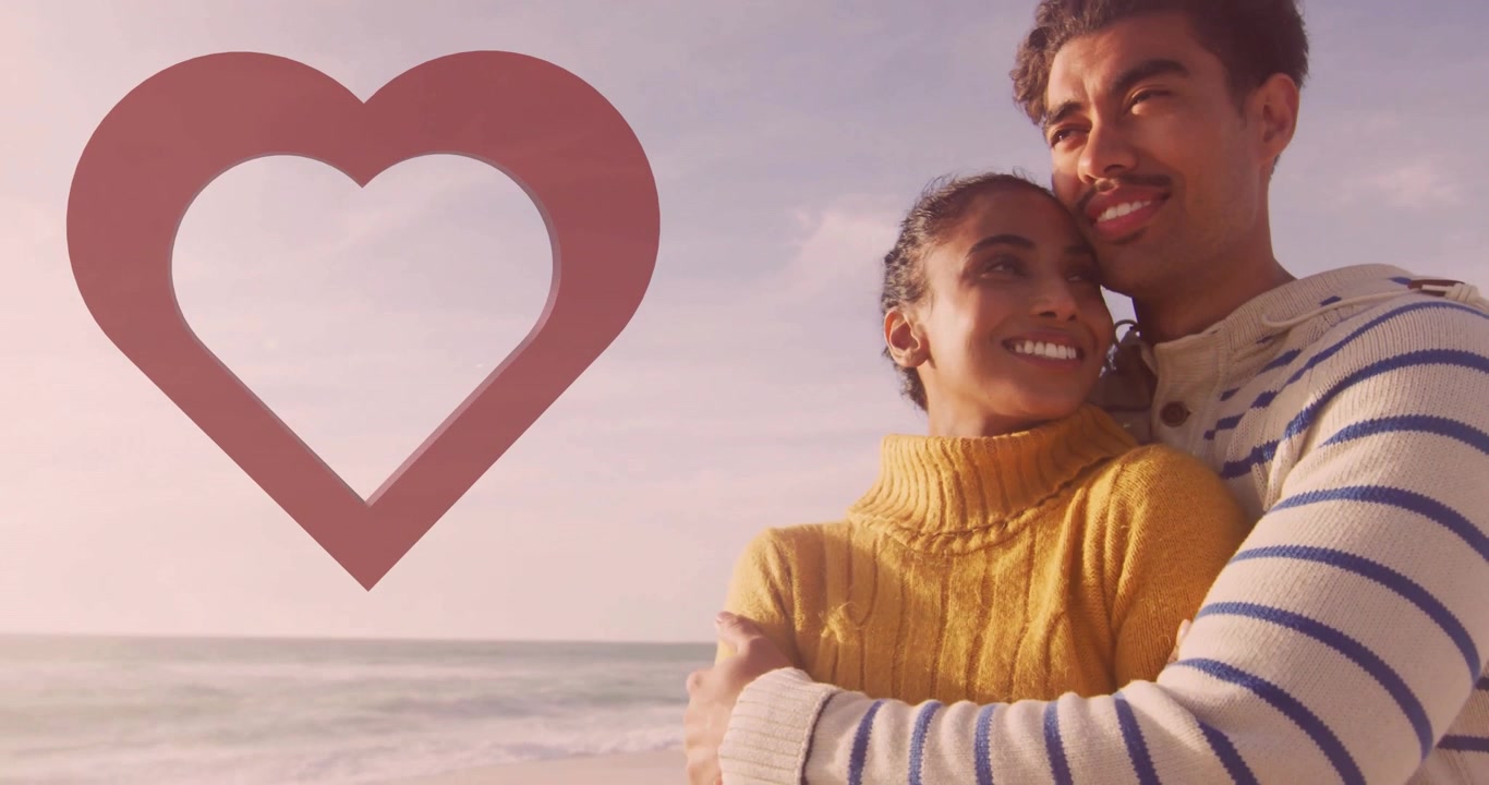 Embracing on beach, couple with heart-shaped animation in foreground, feeling love