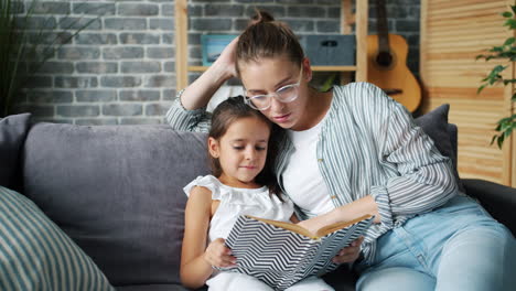 mother and daughter reading together