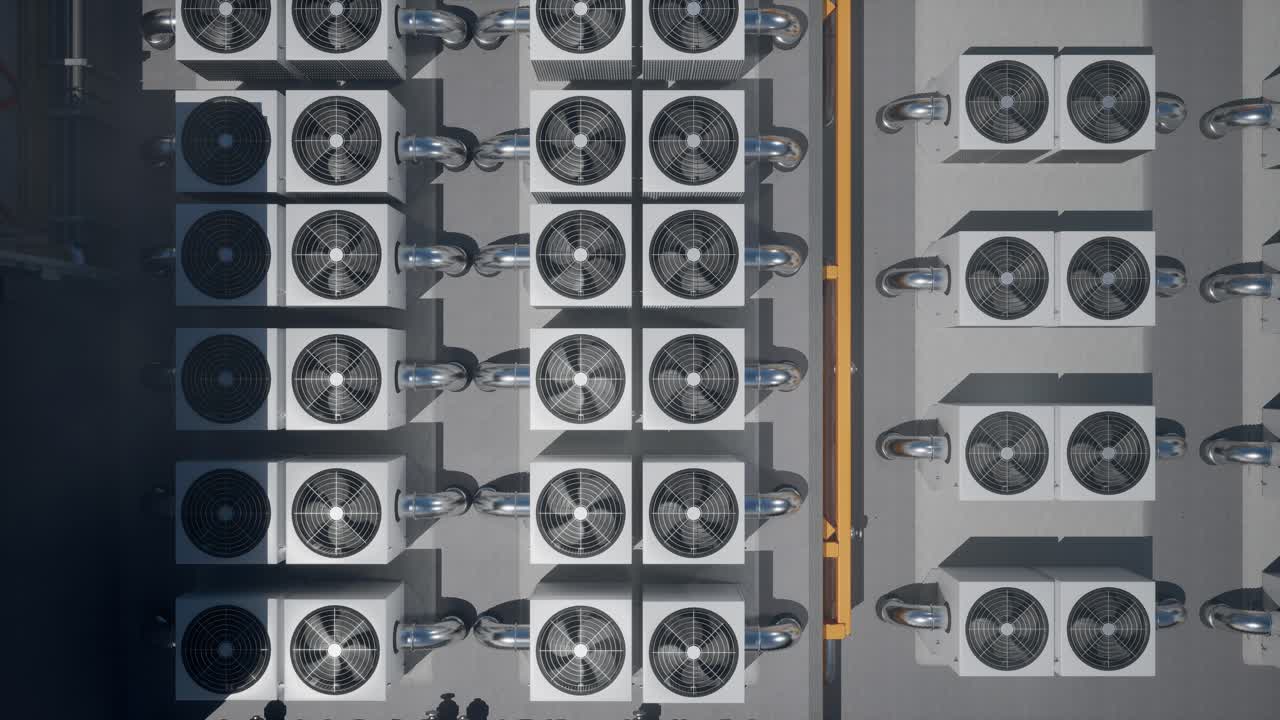 Array of HVAC Units on a Rooftop of a Modern Building