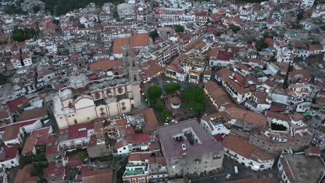 Drone-flight-over-city-buildings-downtown-while-on-vacation