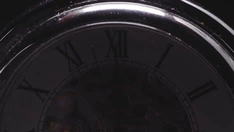 light passing on vintage silver pocket working with roman numeral