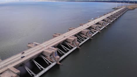 Aerial-drone-over-the-Netherlands,-Stellendam,-Haringvlietdam-bridge-and-Dam-part-of-Deltaworks