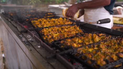 closeup shot of barbecuing chicken seekh kebab on griller