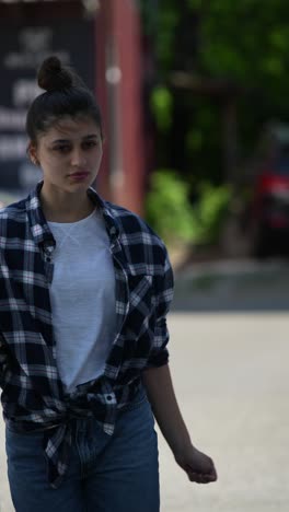 young woman by parking meter