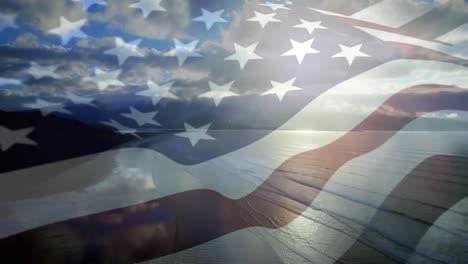 Digital-composition-of-waving-us-flag-against-aerial-view-of-the-beach