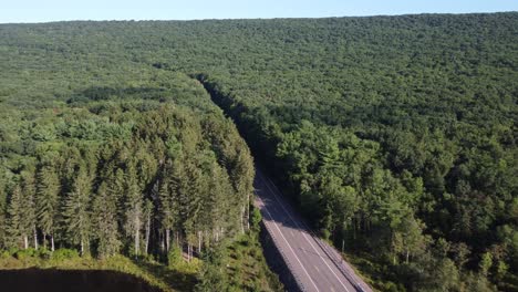 birds-eye-view-to-a-rural-Pennsylvania-road-in-a-forest