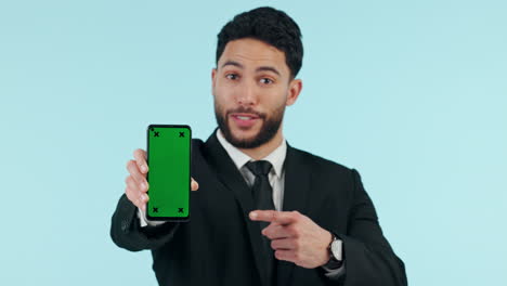 Happy-businessman,-phone-and-pointing-to-green