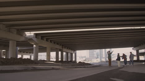 friends under a bridge