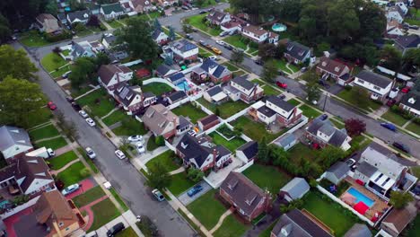 a top down view over a suburban neighborhood in the evening