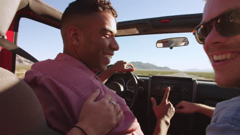 friends on road trip driving in convertible car shot on r3d