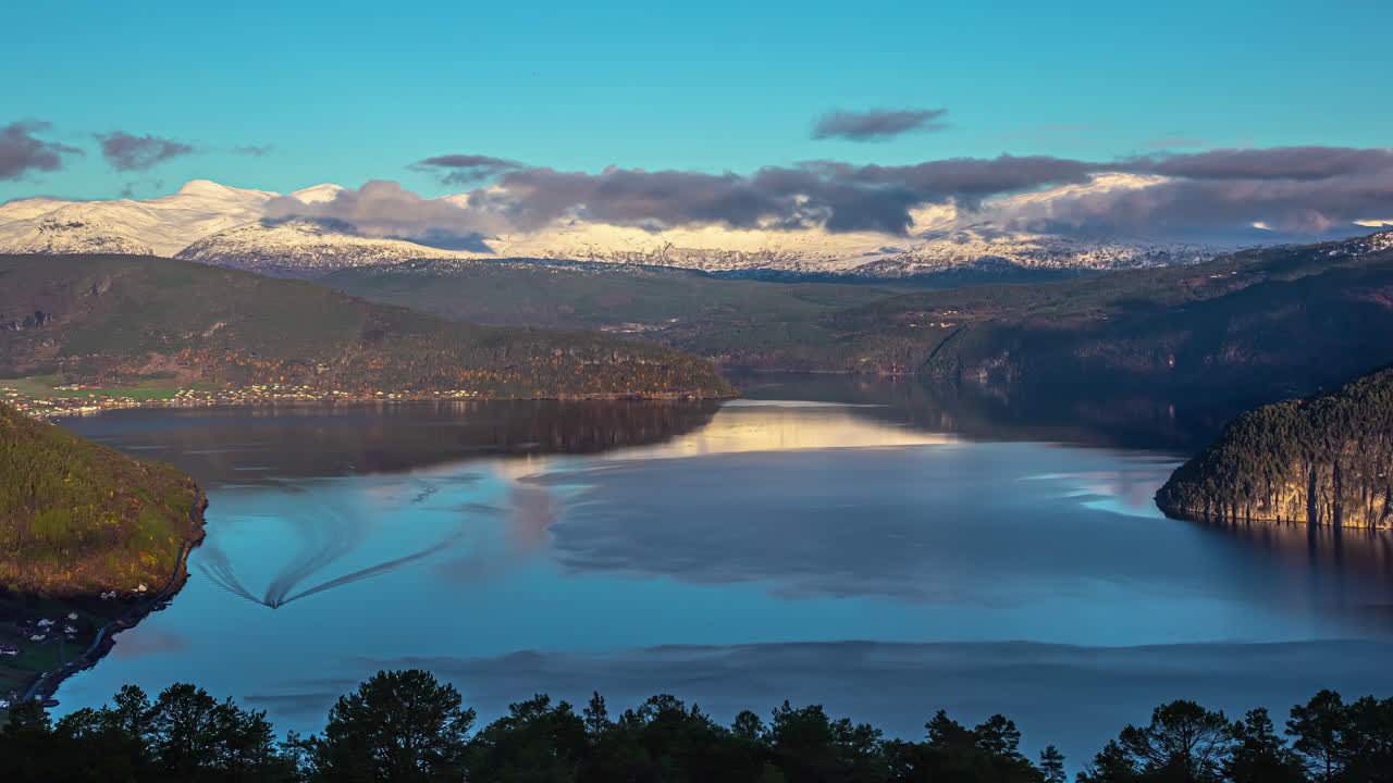 Time lapse of a natural fjord landscape between mountains in Norway