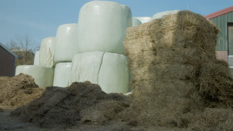 A-pile-of-haybales-standing-outside-on-a-sunny-day