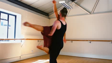 young couple practicing a ballet dance