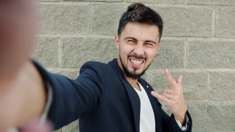 young man taking a selfie