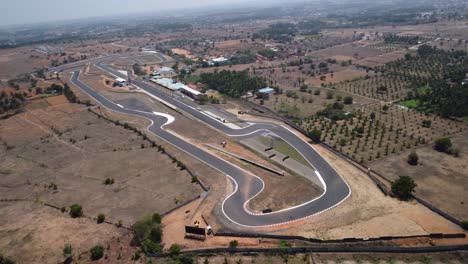 Panoramic-aerial-view-of-Kari-Motor-Speedway-Racetrack-in-Chettipalayam,-Coimbatore,-Tamil-Nadu,-India