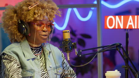 woman radio host in studio