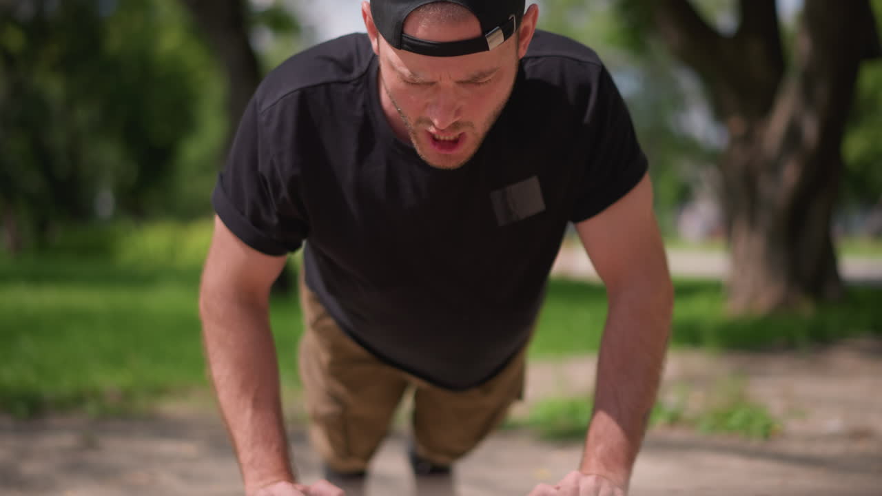 Closeup Of Man During Workout, Closeup Image Of Man Doing Pushups In Outdoor Environment, Detailed Shot Of Man Engaged In Vigorous Outdoor Pushup Exercise Demonstrating Determination