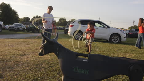 young boys practicing rodeo roping skills