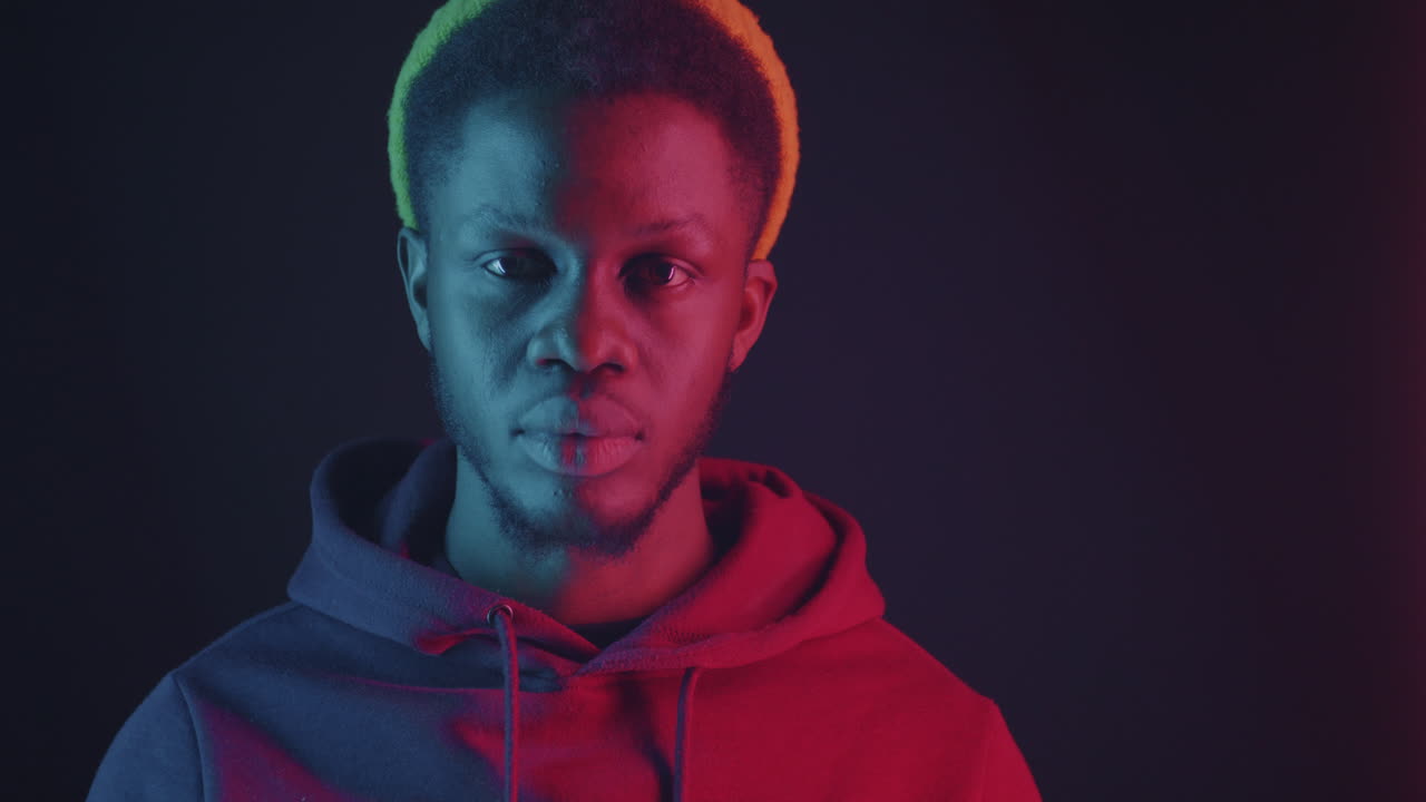 Stylish Portrait of a Man with Neon Lighting