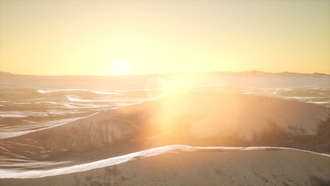 red sand desert dunes at sunset