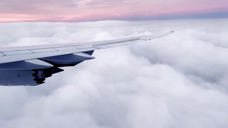 storm-clouds-at-sunrise,-sunset-out-airline-plane-window