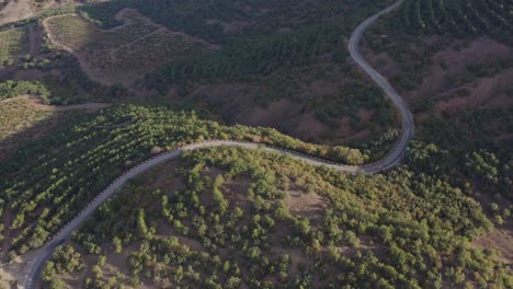 Drone-flying-over-amazing-mountain-winding-road